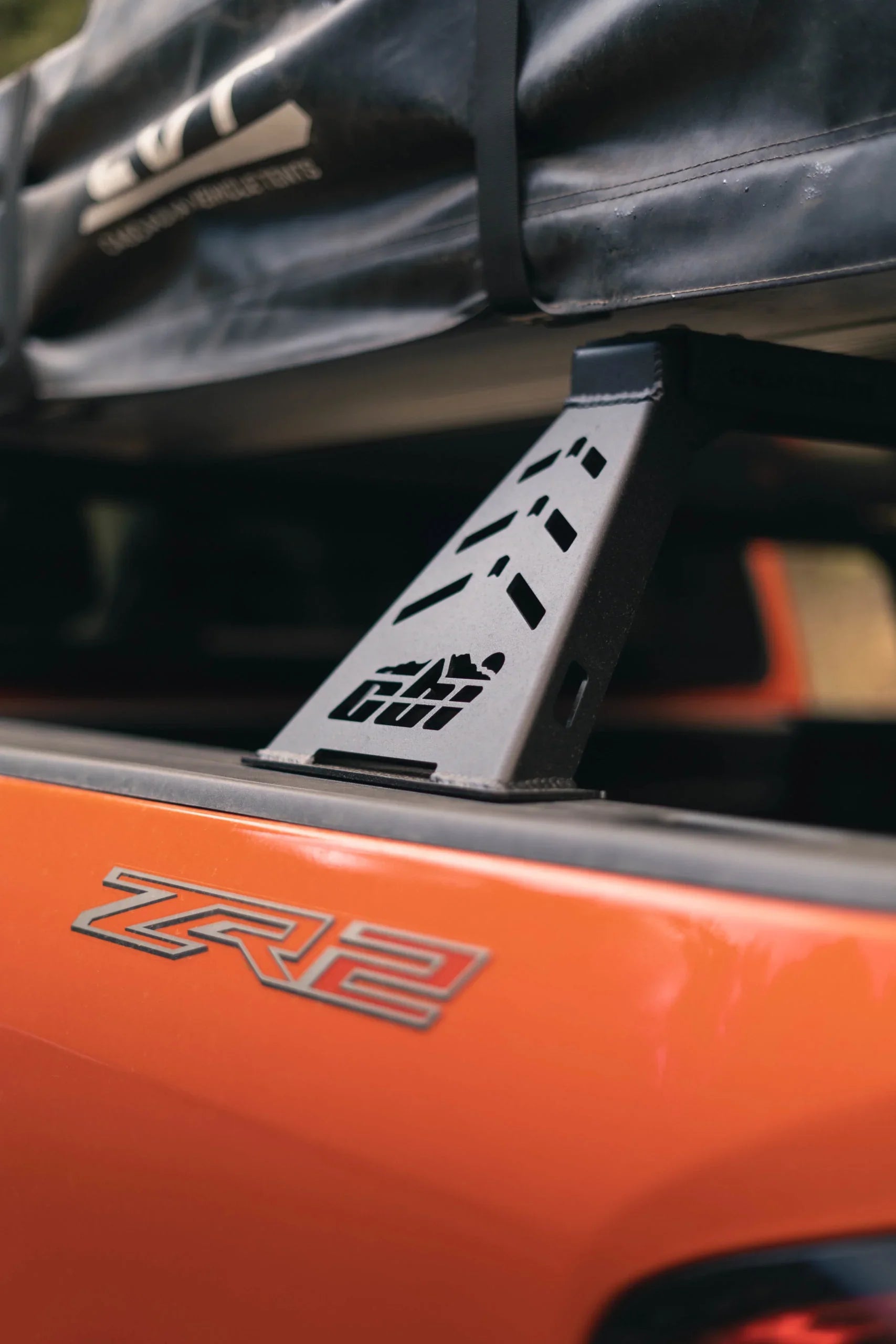 Chevy Colorado ZR2 with overland bed bars and rooftop tent mount, close-up detail view