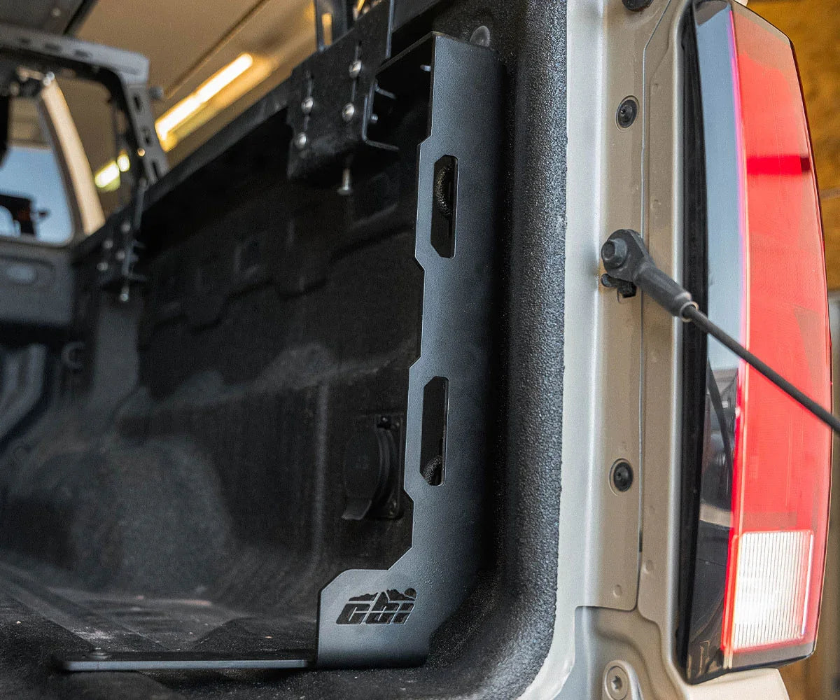 Truck bed stiffener installed on interior of pickup tailgate, close-up view