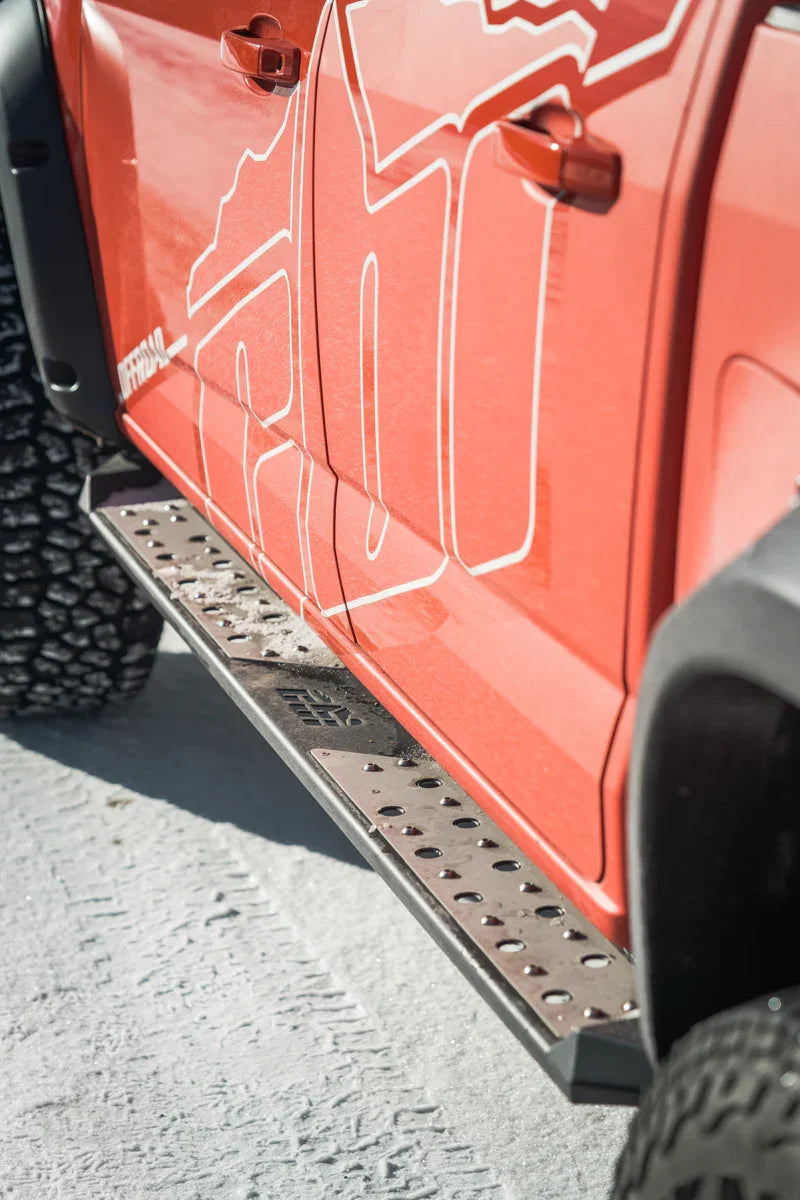 Chevrolet Colorado ZR2 with rugged side steps, off-road tires, and custom graphics
