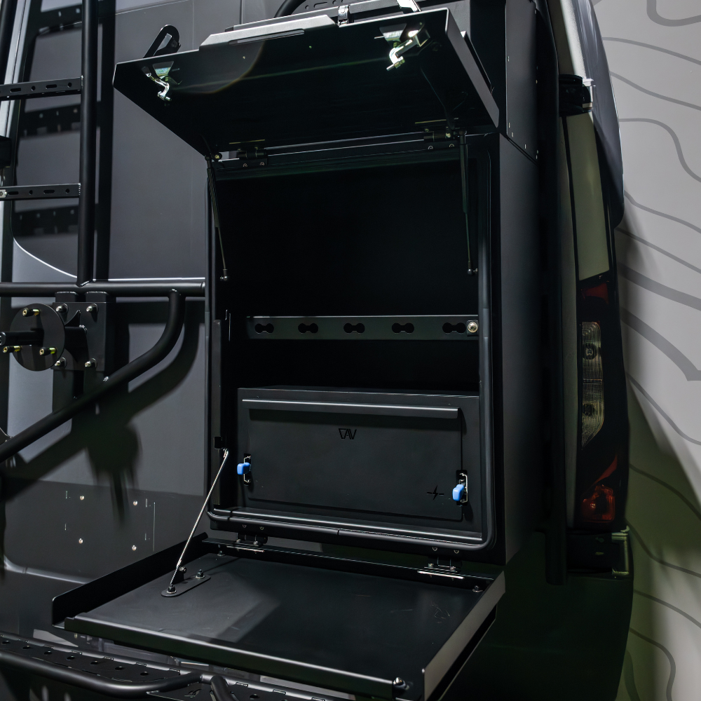 Overlanding vehicle gear storage box with fold-down table and ladder mounted on rear door