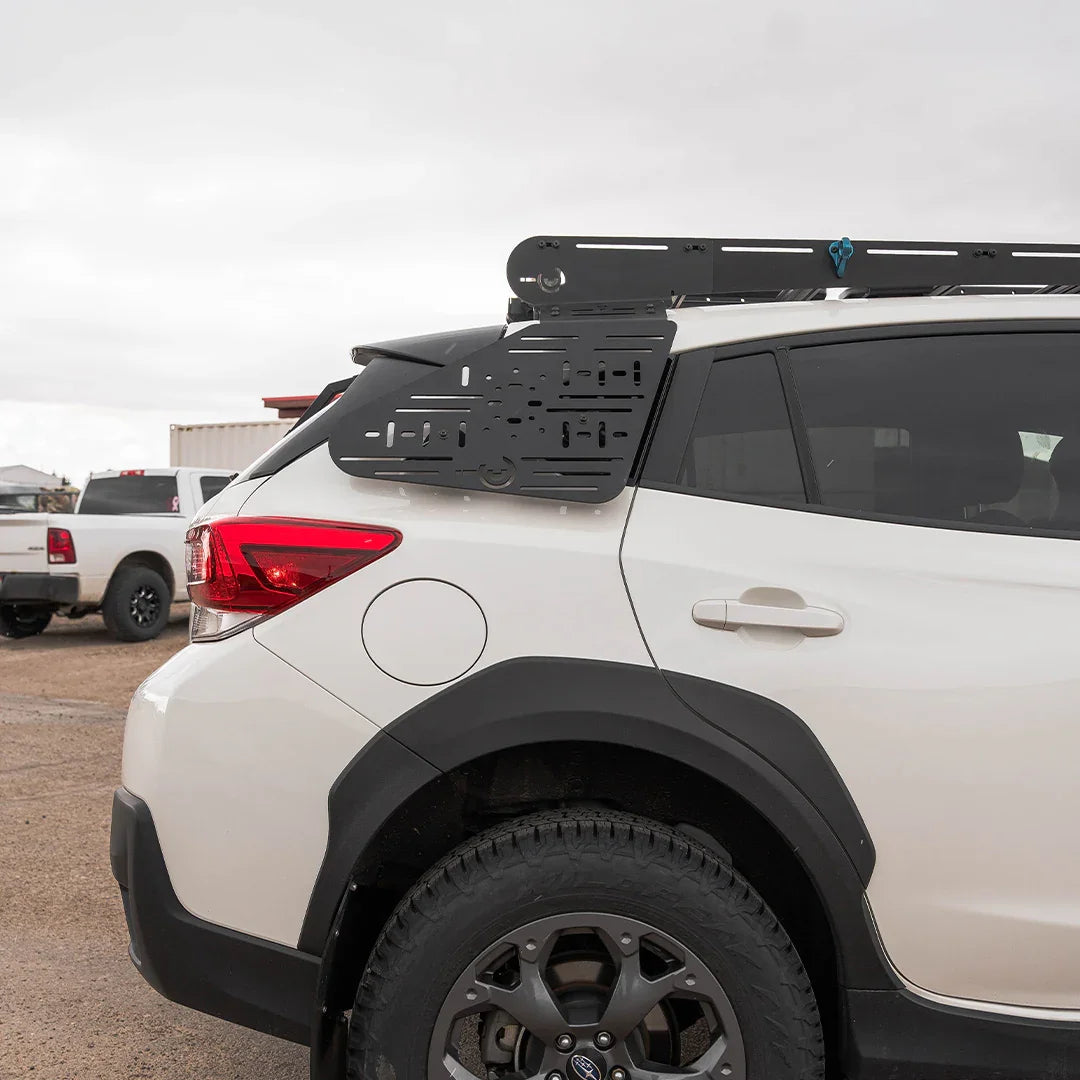 Overlanding accessory panel and roof rack installed on Subaru Crosstrek rear side