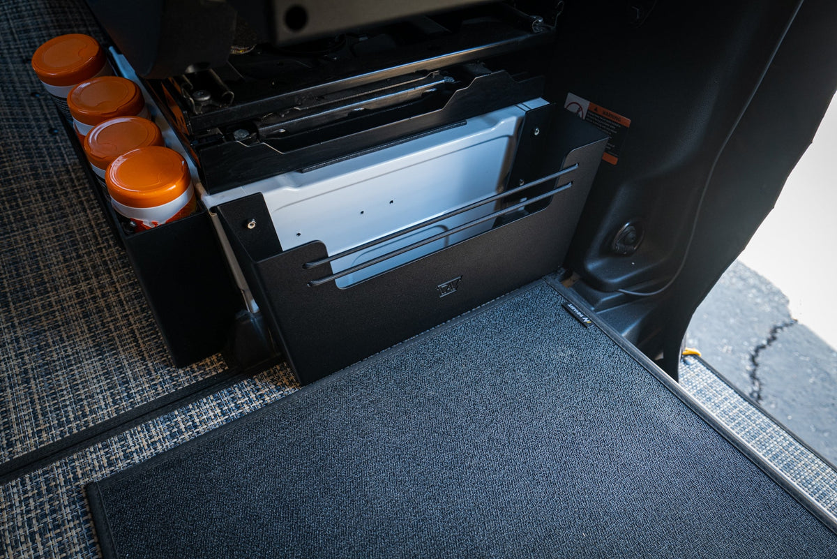 CAV seat base cubby mounted to the Sprinter seat base