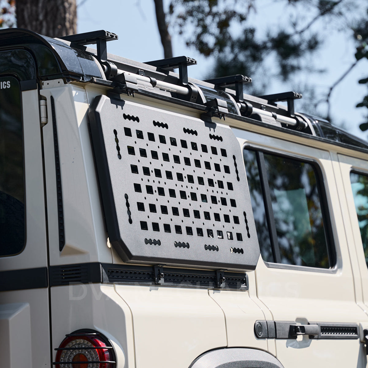 DVA Mechanics Exterior MOLLE Panel mounted on an INEOS Grenadier rear quarter