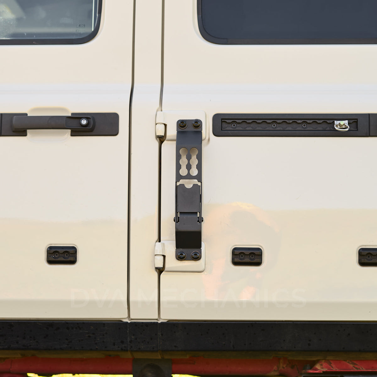 Grenadier side step stowed flat against the vehicle