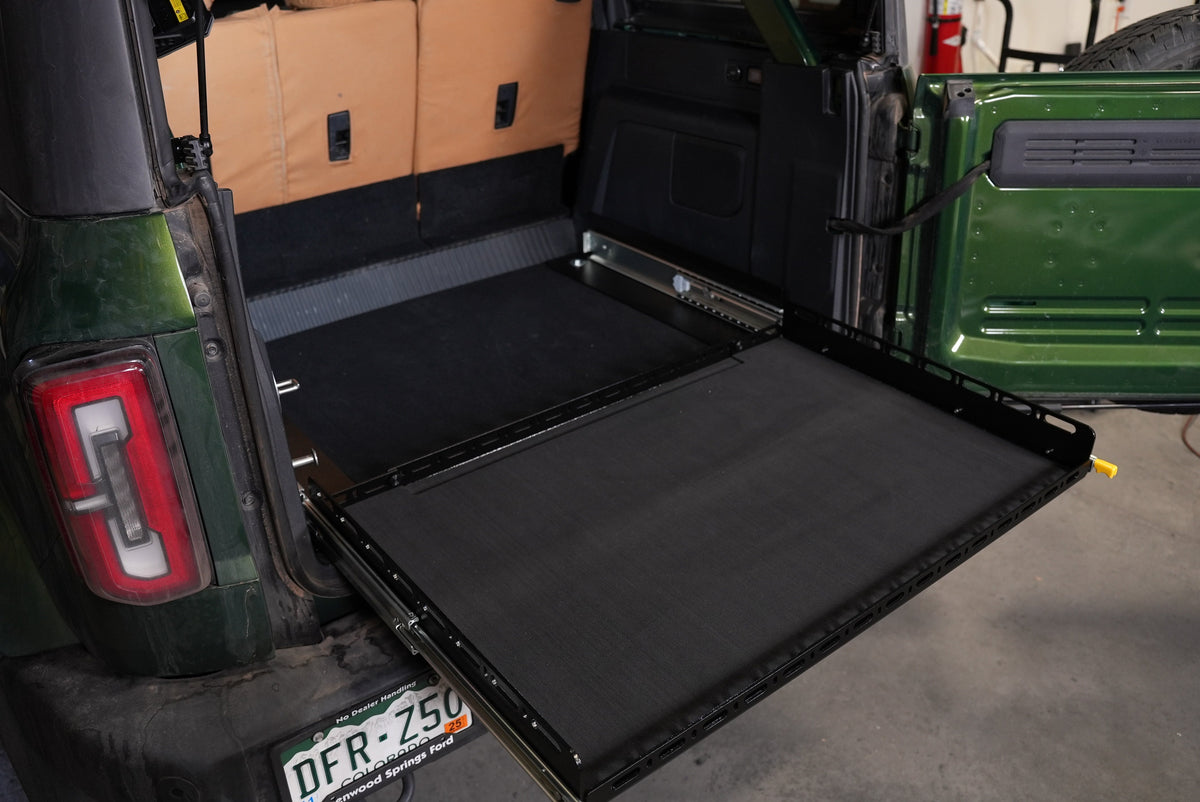 Diabolical Inc Bronco Slide Floor 2.0, loaded with gear