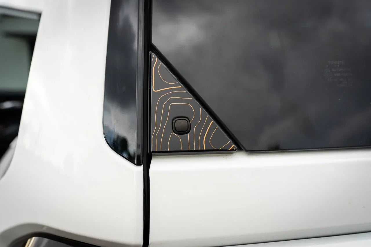 Topo Rear Glass Button Trim Overlay - 2024+ Land Cruiser / GX 550