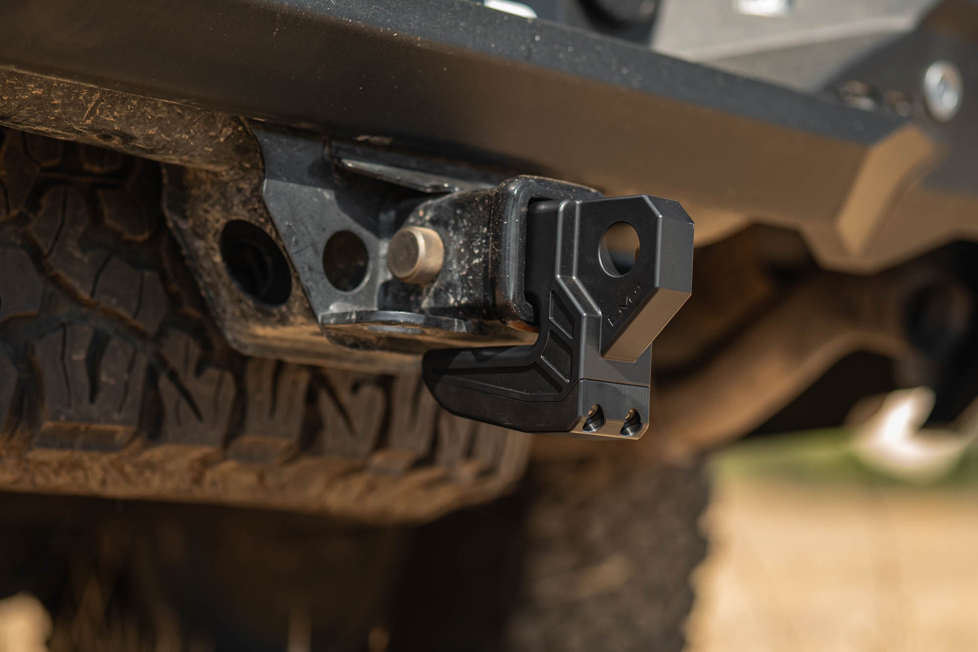 DV8-Xtract-Hitch-Skid-Plate-Black-Installed-3 - NVMOS