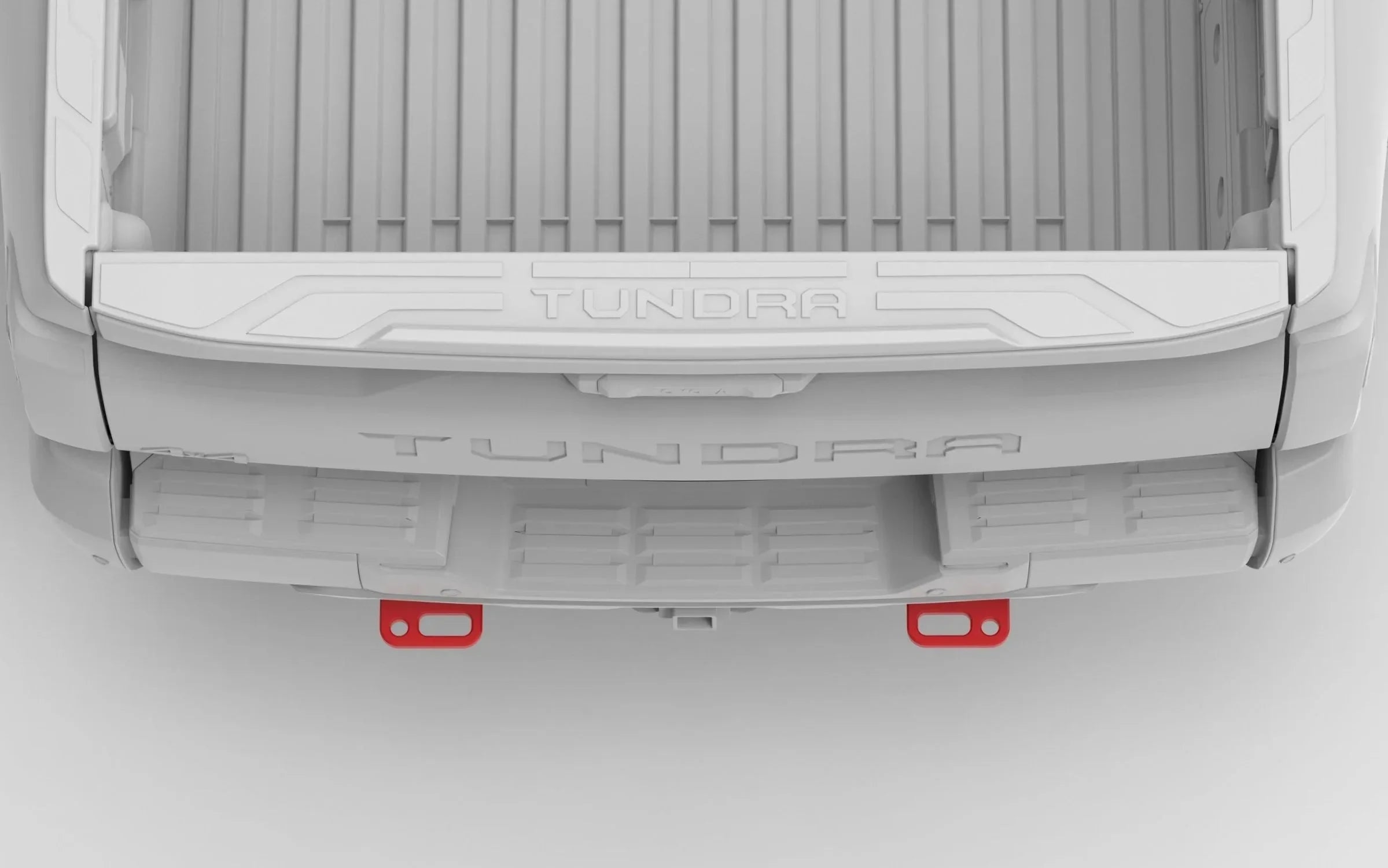 Toyota Tundra truck bed with two red rear recovery points attached to bumper