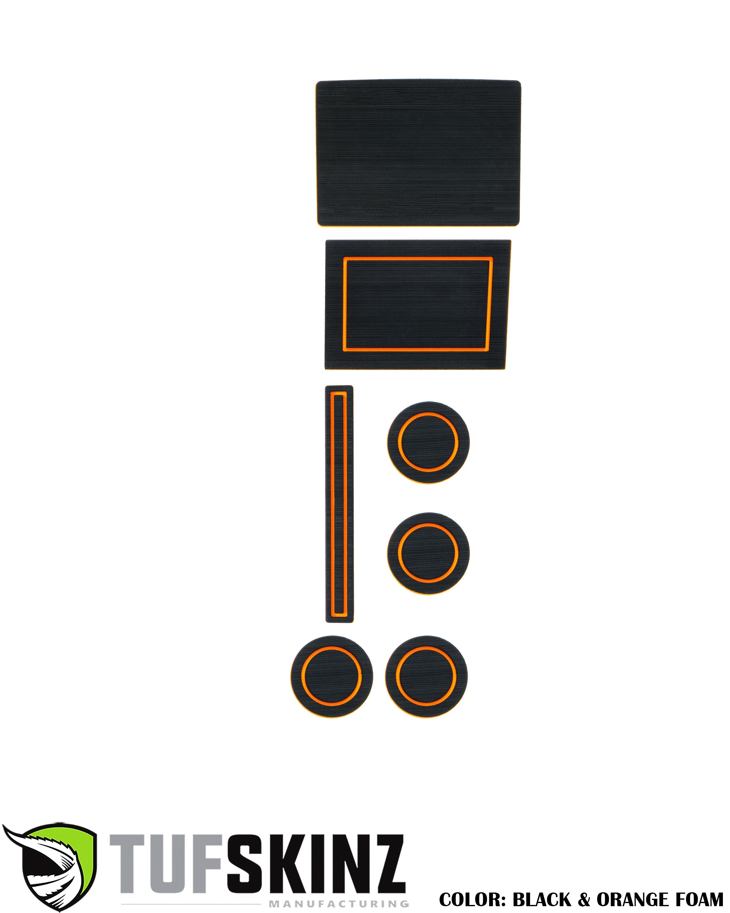 Black and orange foam vehicle interior liner kit with multiple custom-fit pieces