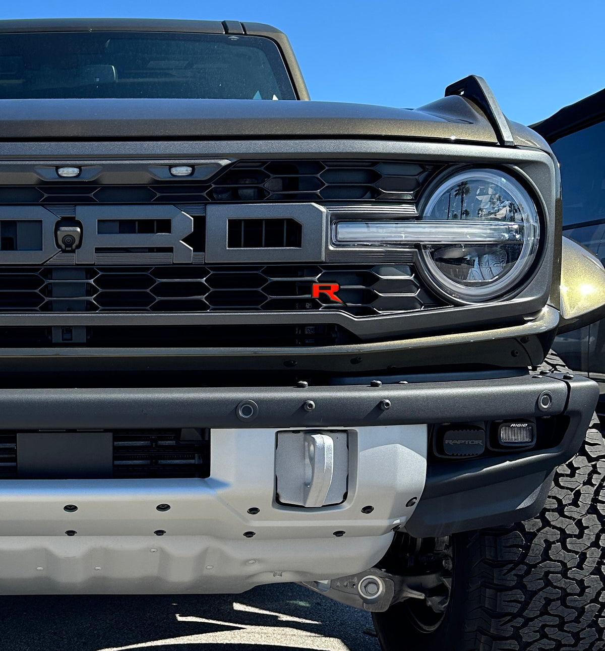Tufskinz Raptor R badge overlay for universal fit
