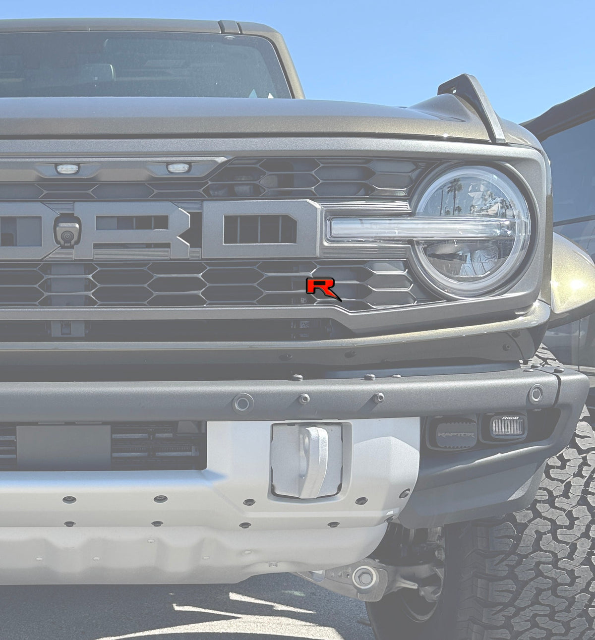 Tufskinz Raptor R badge overlay for universal fit