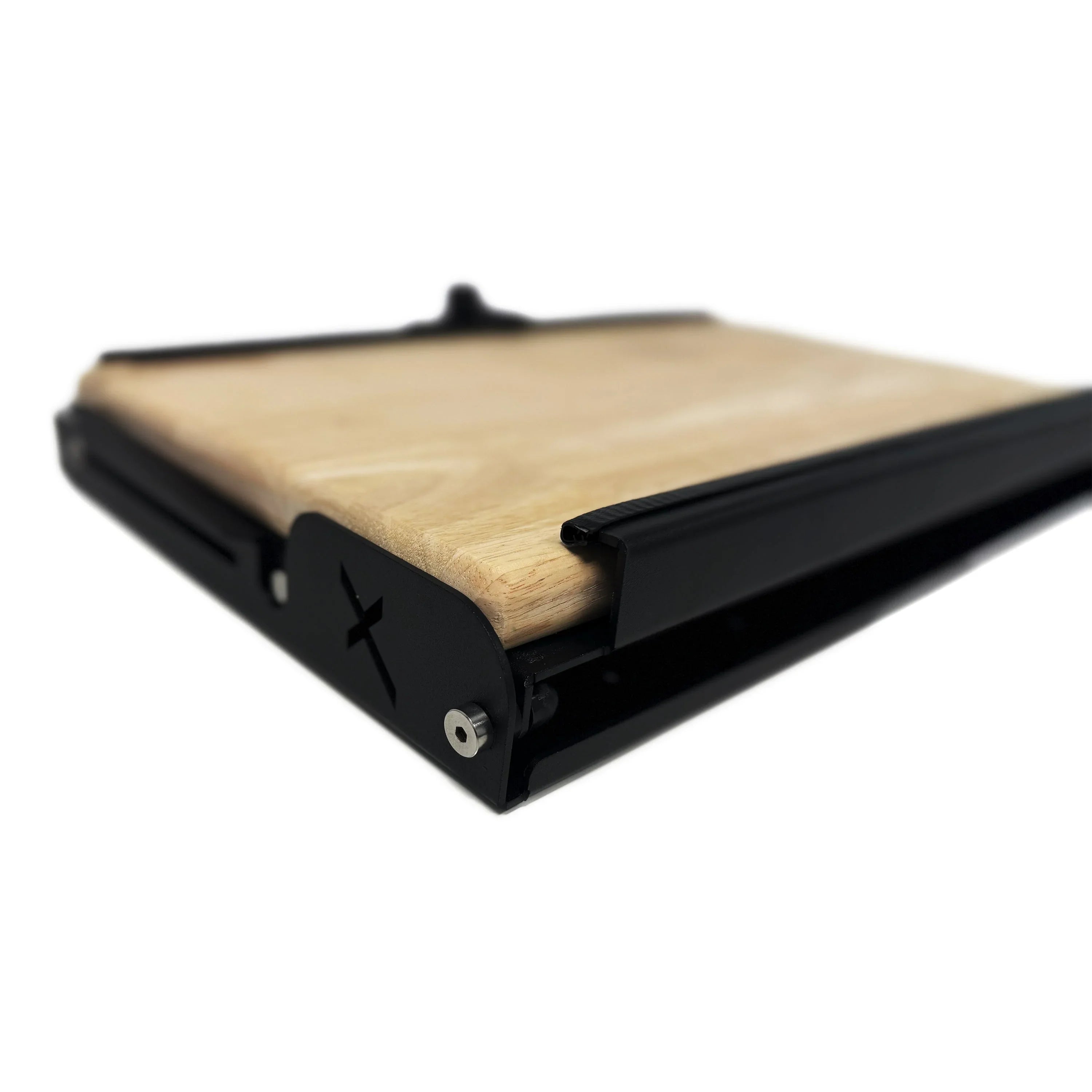 Folding camp table with wood surface and black metal frame for overlanding vehicles