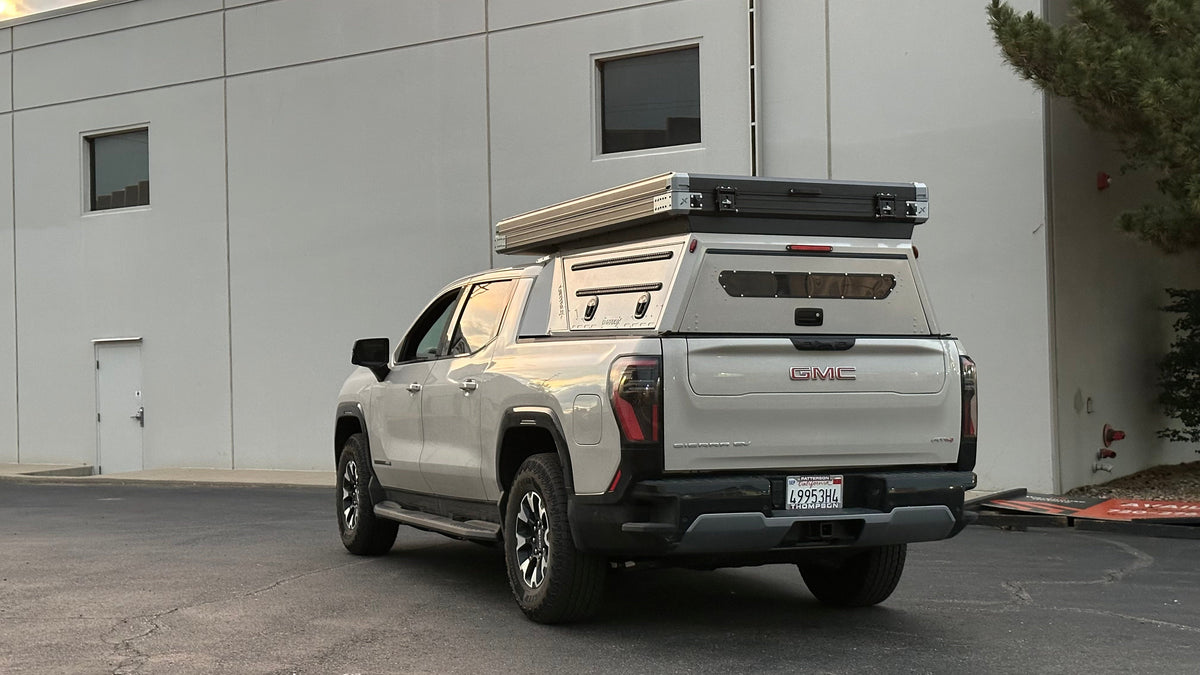 Dirtbox Overland EV pass-through canopy camper for Chevy Silverado EV and GMC Sierra EV