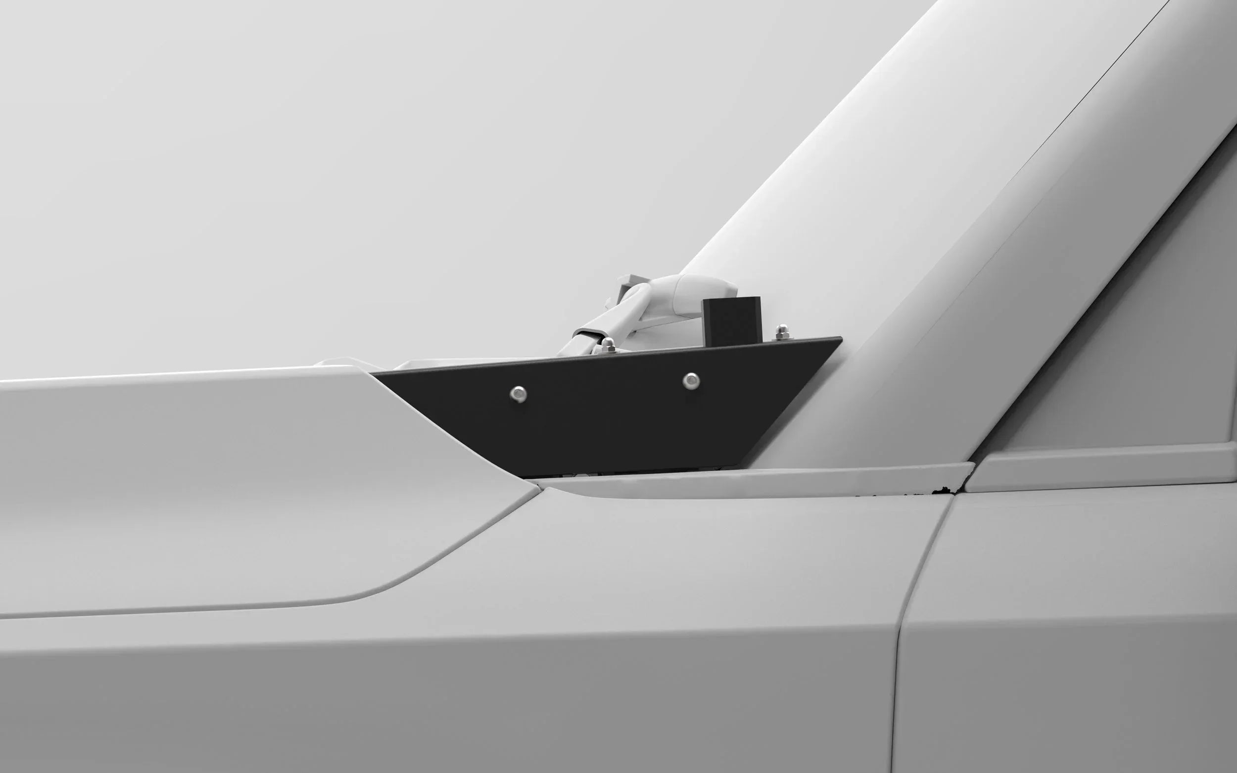 Close-up of a black metal mounting bracket installed on a vehicle roof for overlanding gear