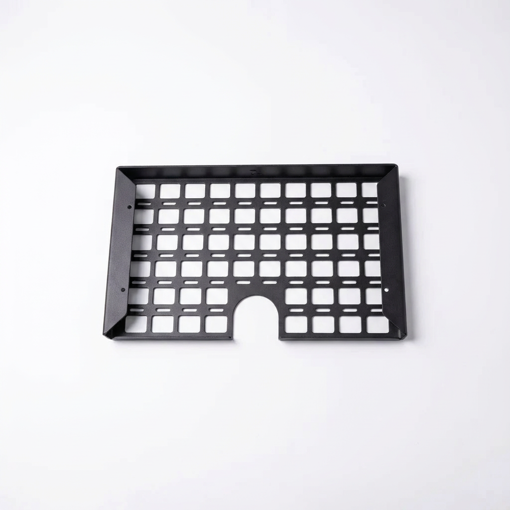 Black modular metal cargo panel for overlanding vehicle storage, isolated on white background