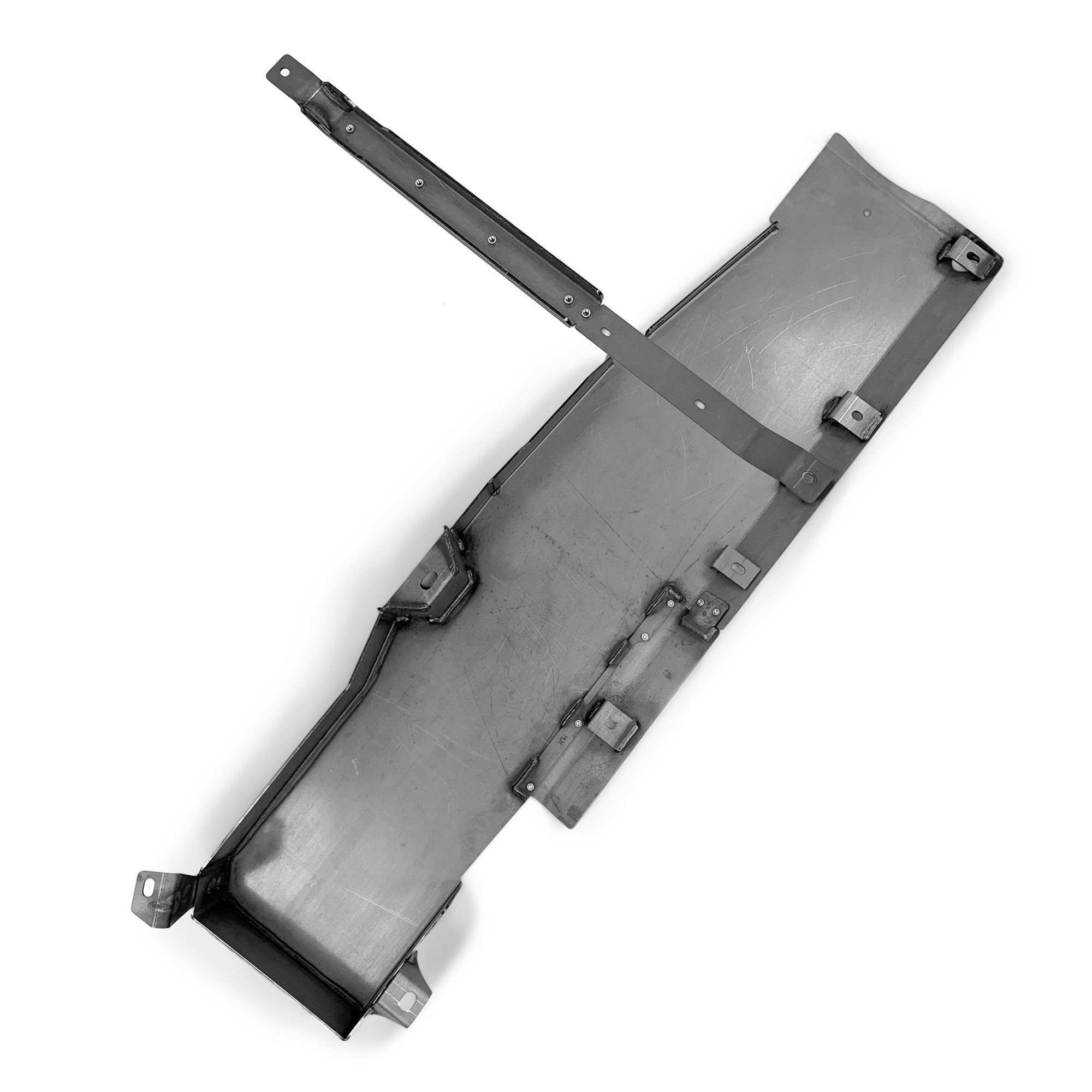 Steel skid plate for off-road vehicle undercarriage protection, isolated on white background