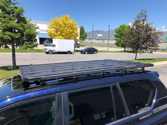 Heavy-duty roof rack installed on SUV, ideal for overlanding and expedition gear