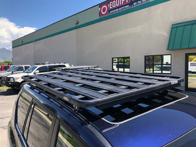 Heavy-duty roof rack installed on SUV, ideal for overlanding and expedition gear