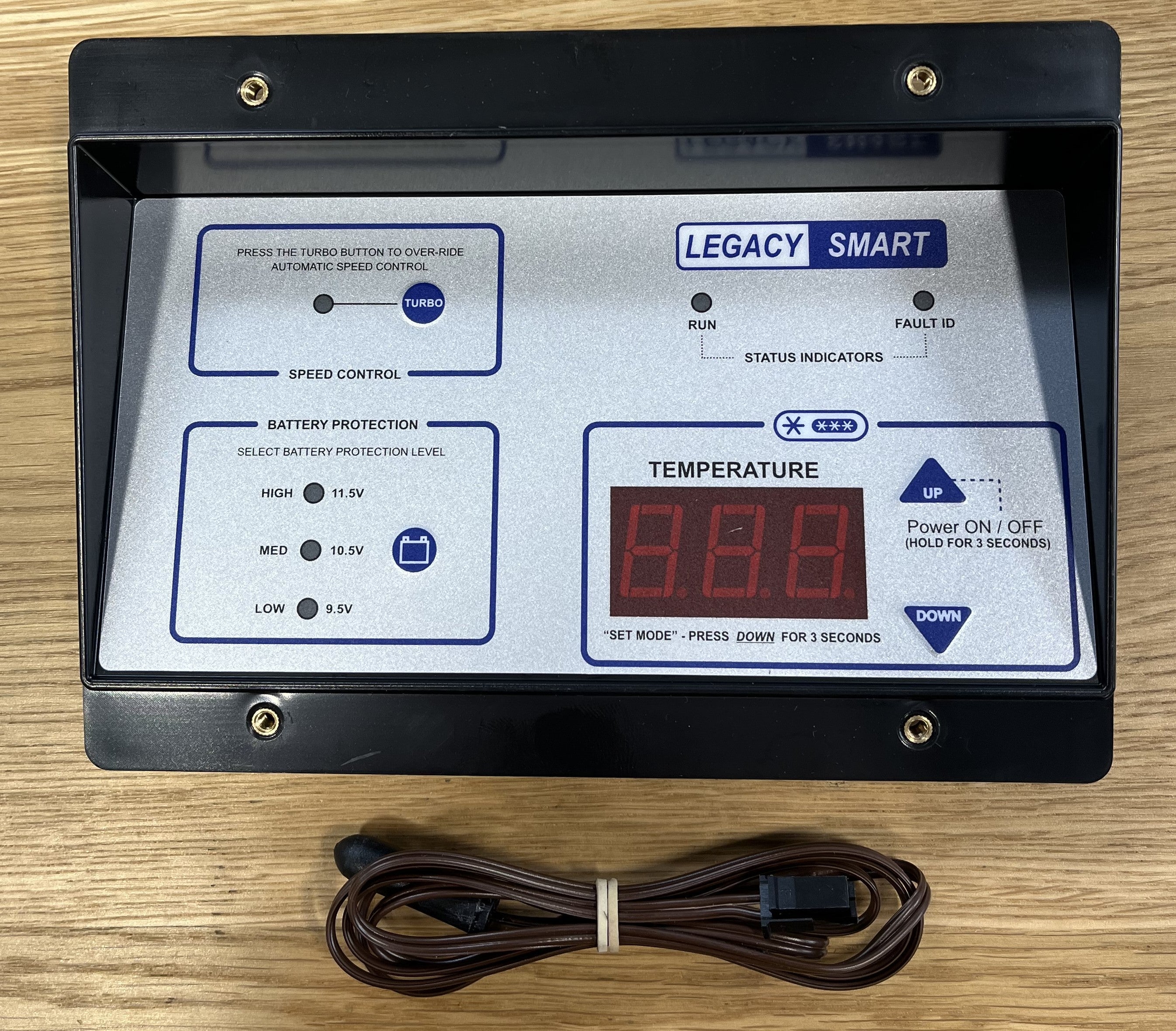 Legacy Smart temperature control panel for overlanding battery and speed management on wood surface