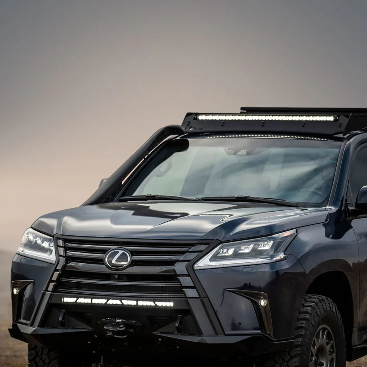 Front view of Lexus SUV with off-road roof rack, snorkel, and LED light bars