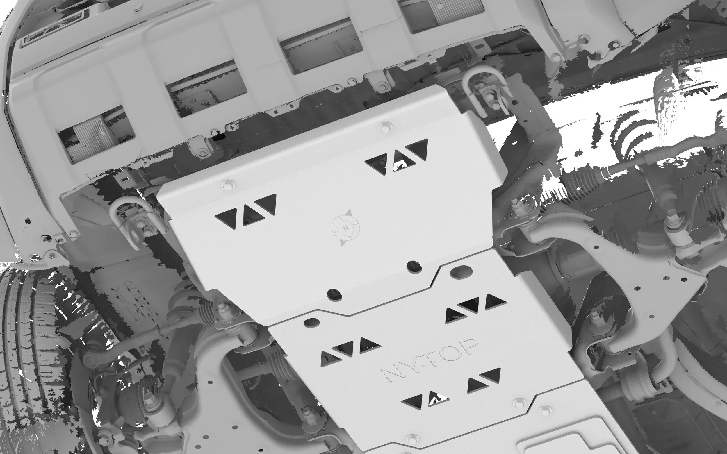 Steel skid plate installed under vehicle chassis for off-road protection and overlanding