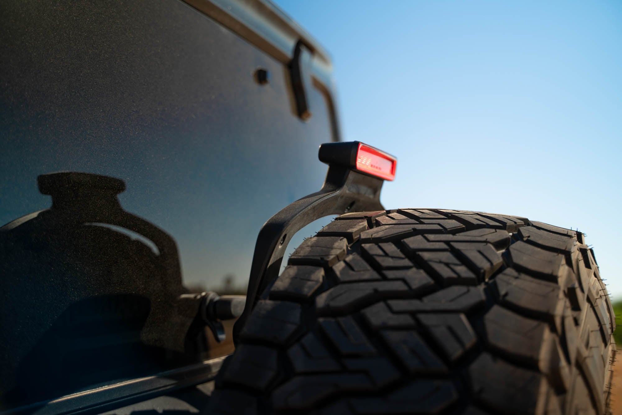 Jeep-JL-Bumper-Mounted-Tire-Carrier_Installed-02 - NVMOS