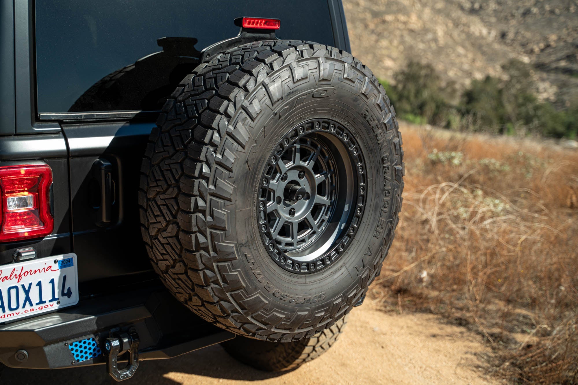 Jeep-JL-Bumper-Mounted-Tire-Carrier_Installed-06 - NVMOS