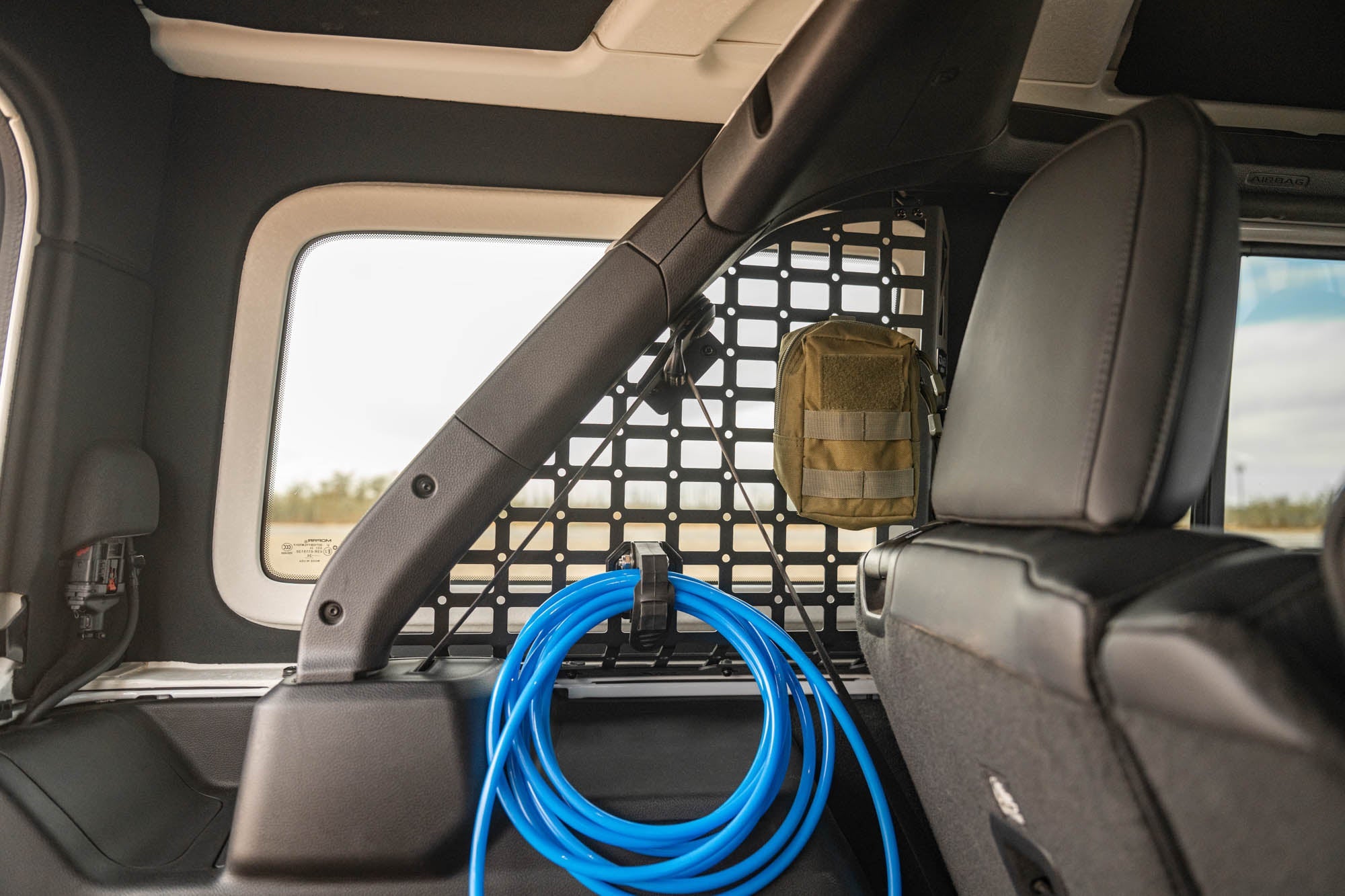 Jeep-Wrangler-JL-4-Door-Rear-Window-Pocketed-Molle-Panels-Installed-5 - NVMOS