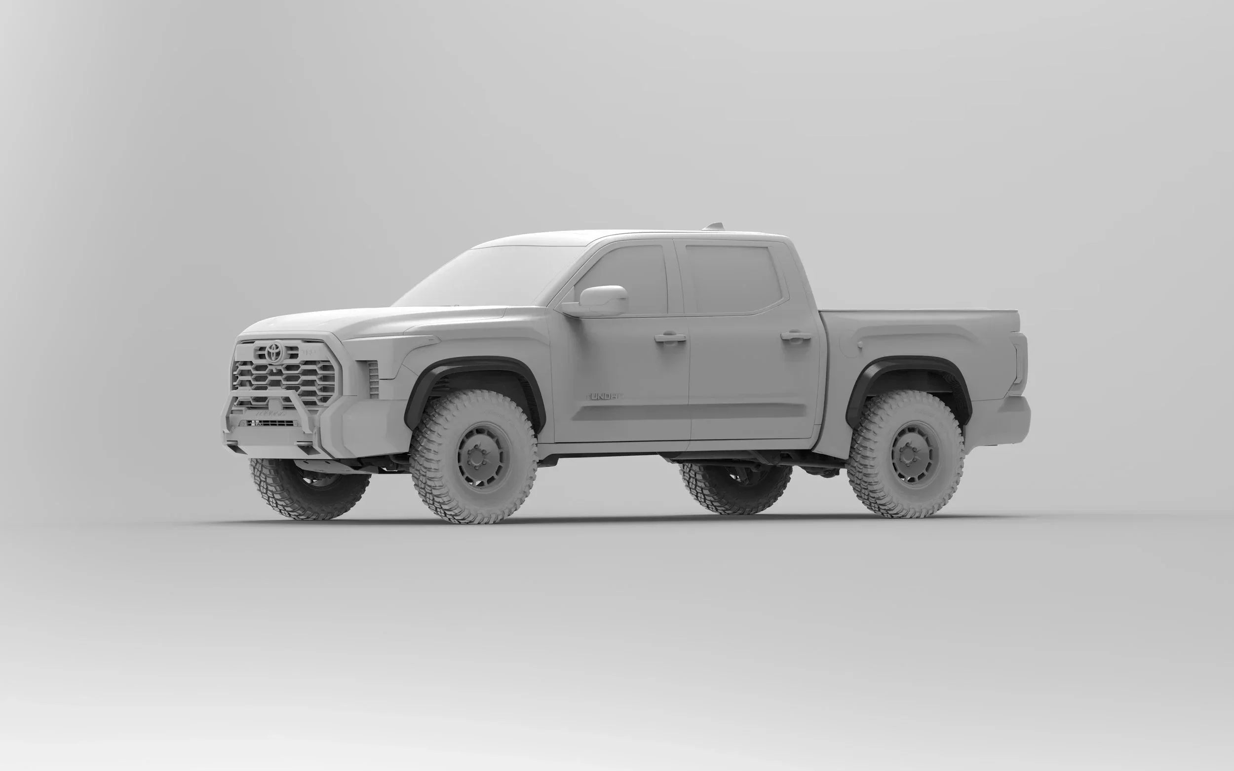 Gray 3D render of an off-road Toyota Tundra truck with rugged tires, side view