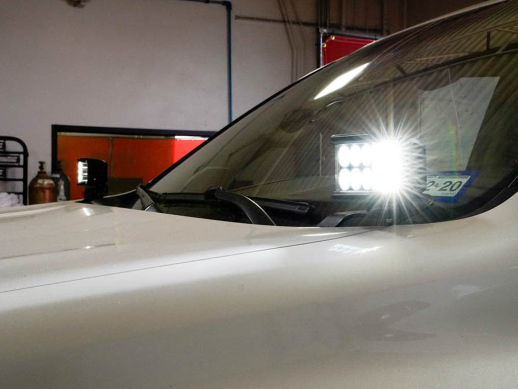 LED ditch light mounted on vehicle hood for off-road and overlanding visibility