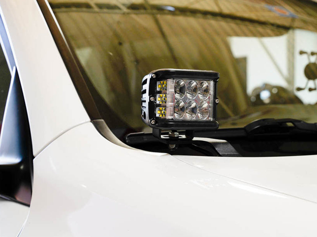LED ditch light mounted on vehicle hood for off-road and overlanding use