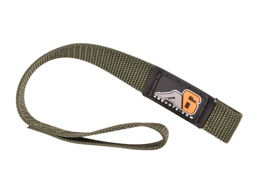 Green nylon strap with loop and A6 badge, overland camping gear accessory