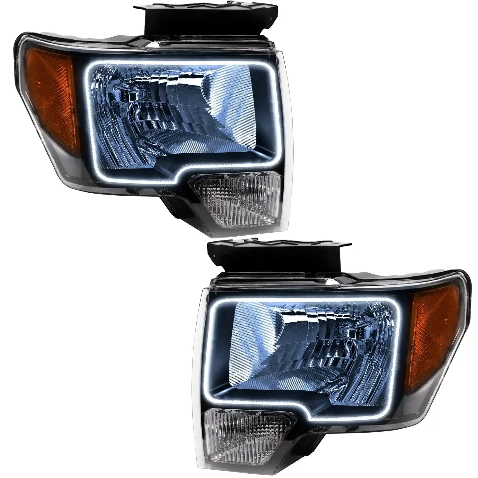 Pair of aftermarket LED headlights for Toyota Tacoma, clear lens with white DRL accents