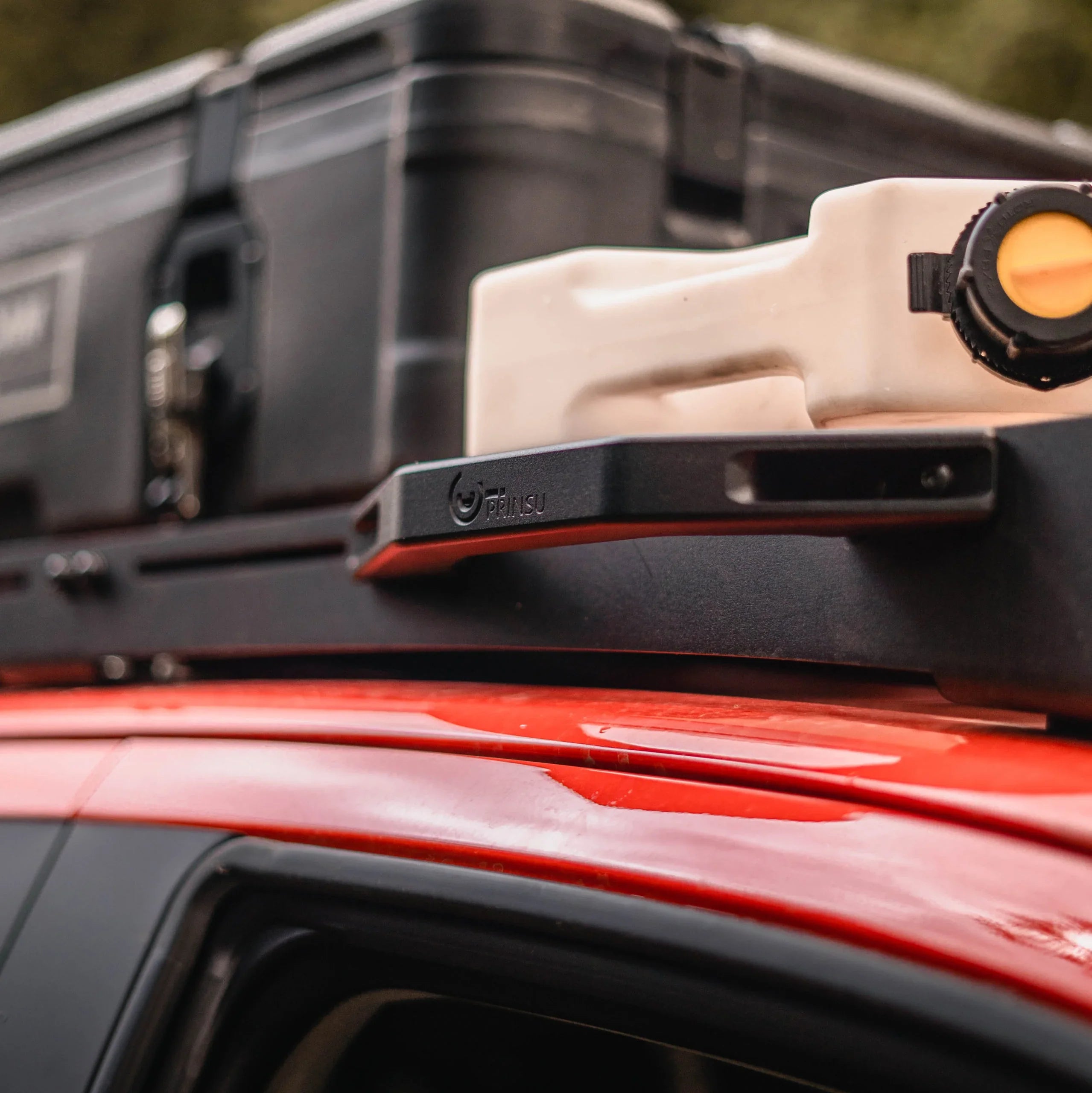 Prinsu roof rack summit handle on red vehicle with cargo boxes, overlanding accessory