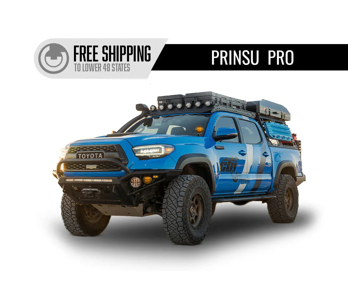 Blue Toyota Tacoma with Prinsu Pro roof rack, off-road gear, LED lights, and overlanding accessories.