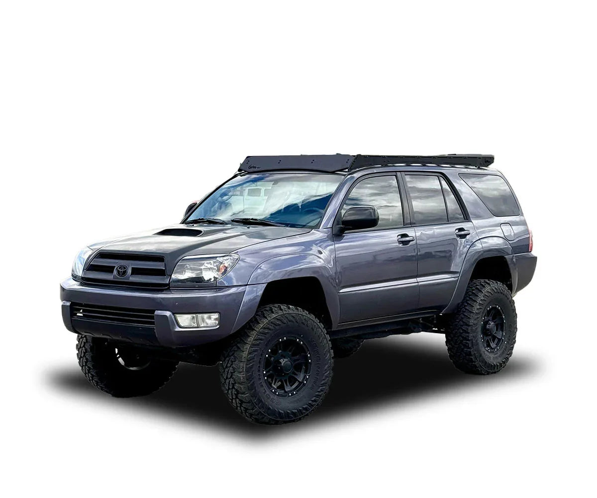 Toyota 4Runner with full roof rack and off-road tires, ideal for overlanding gear.