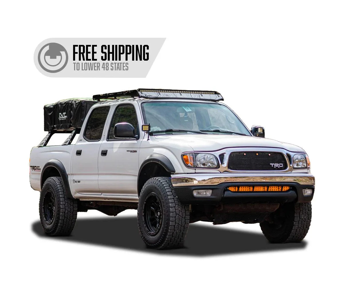 Toyota Tacoma 1st gen double cab with Prinsu roof rack and overlanding gear, off-road setup