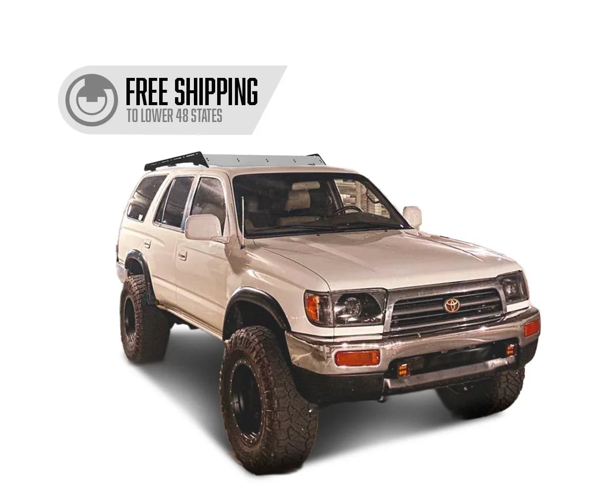 Toyota 4Runner with Prinsu 3/4 roof rack, lifted suspension, all-terrain tires, white background