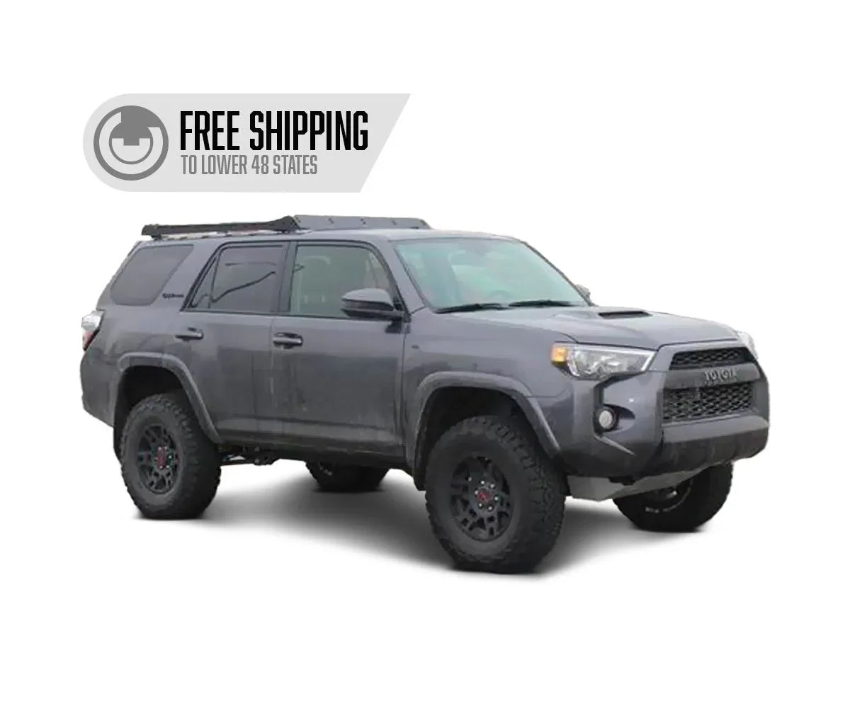 Toyota 4Runner SUV with Prinsu roof rack, off-road tires, and free shipping banner