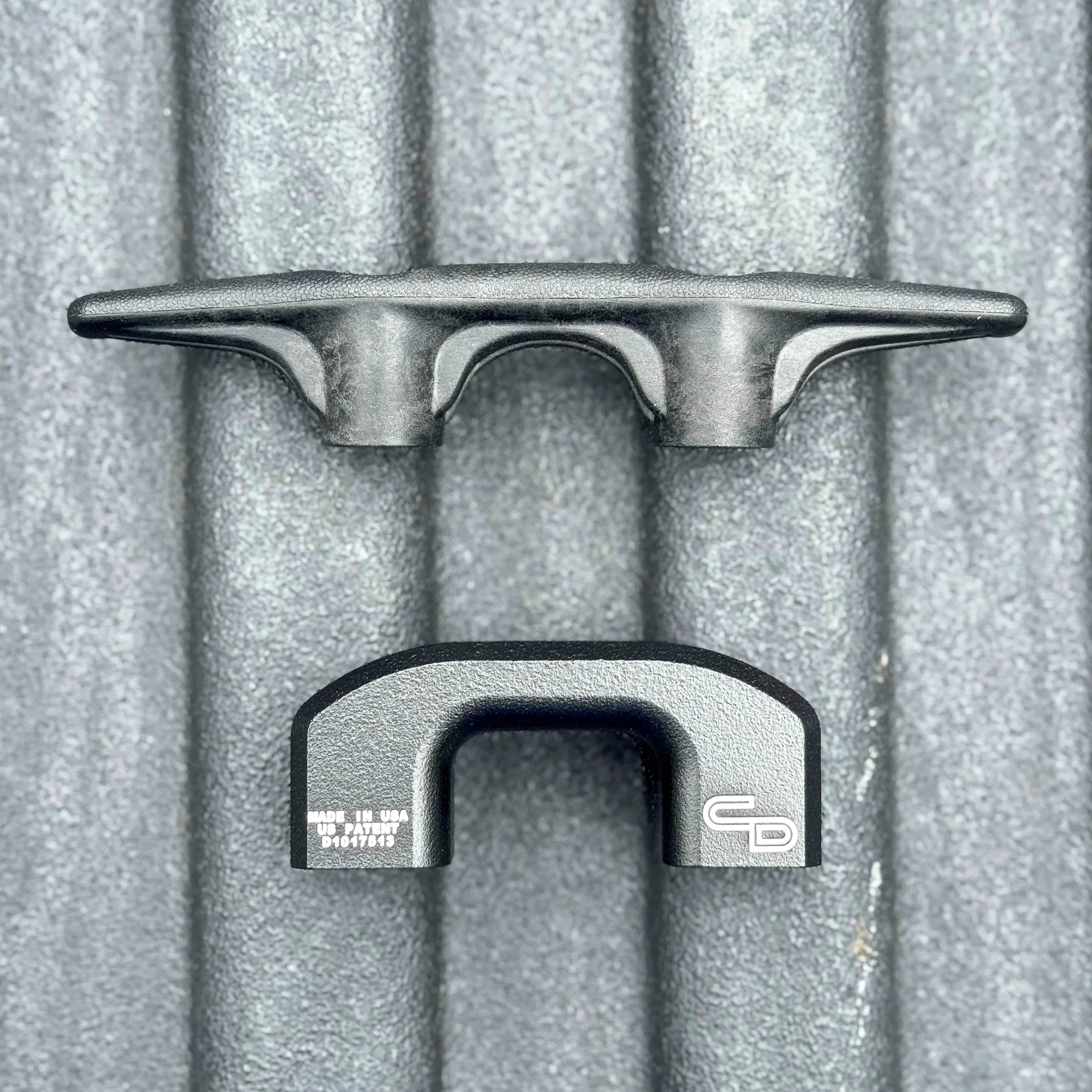 Bed tie down cleat and mounting hardware on textured truck bed liner
