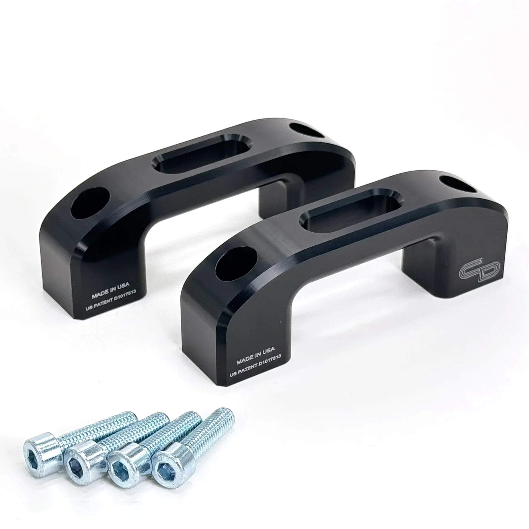 Black anodized aluminum tie down brackets with four hex bolts for vehicle bed