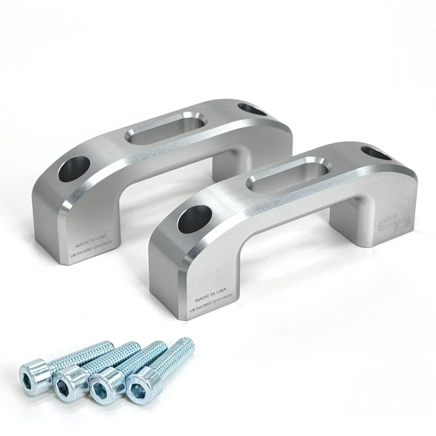 Silver anodized tie down anchors with bolts for truck bed, overland gear accessory.