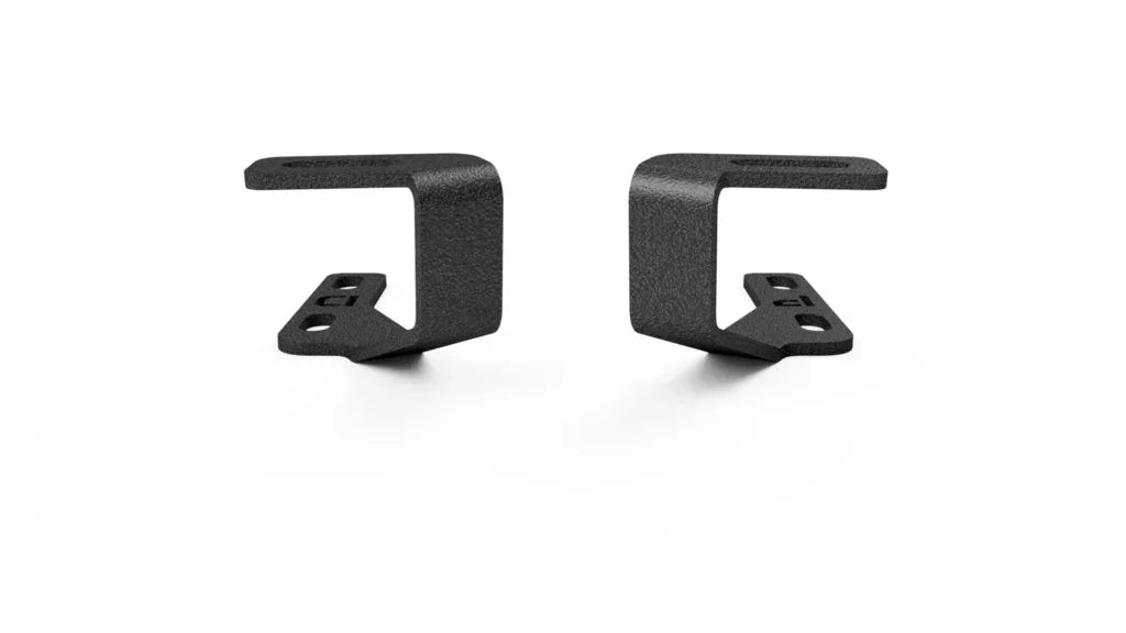 Pair of black steel ditch light brackets for Toyota RAV4 Gen 5 on white background