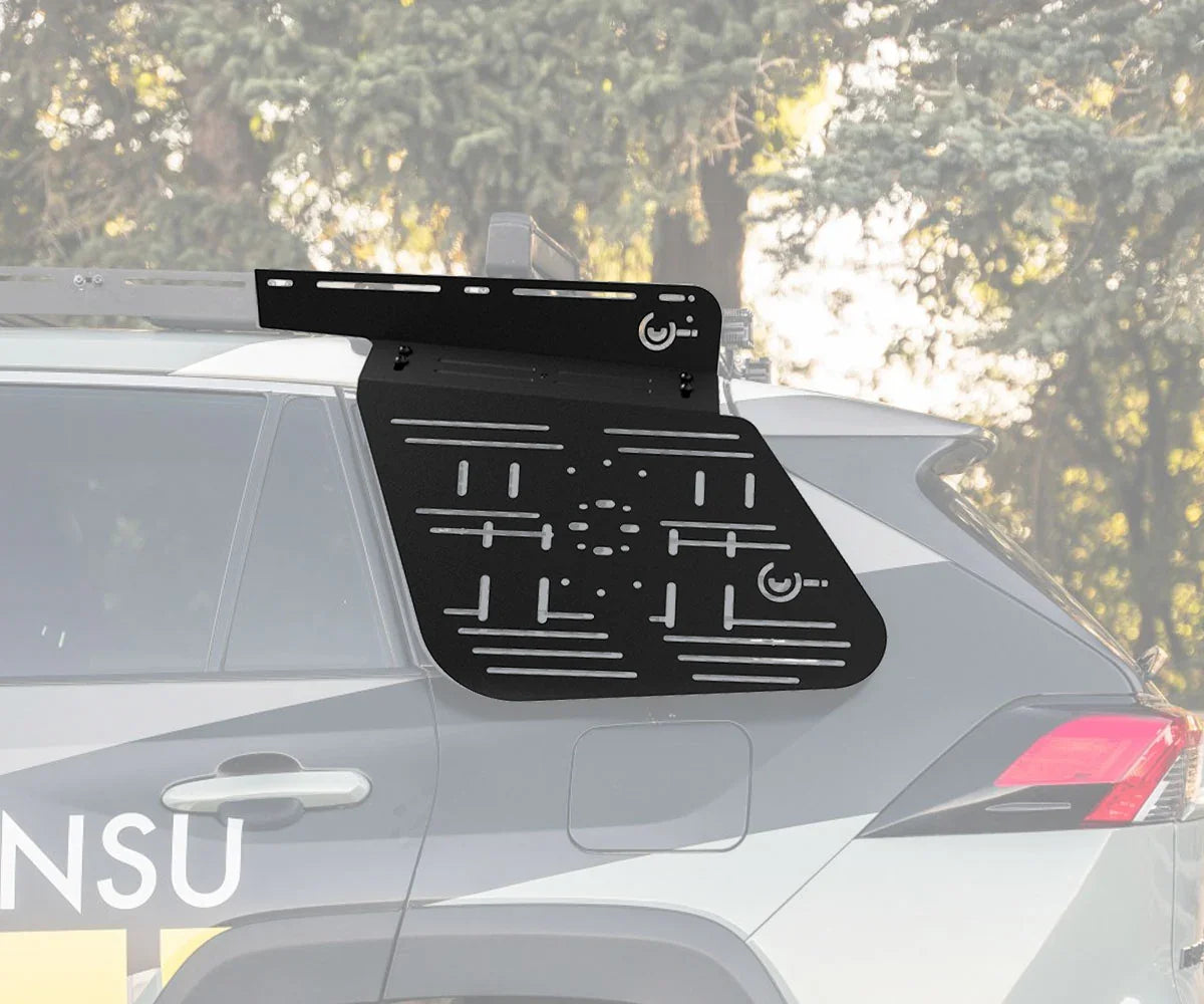 Side window modular molle storage panel mounted on Toyota RAV4 for overlanding gear