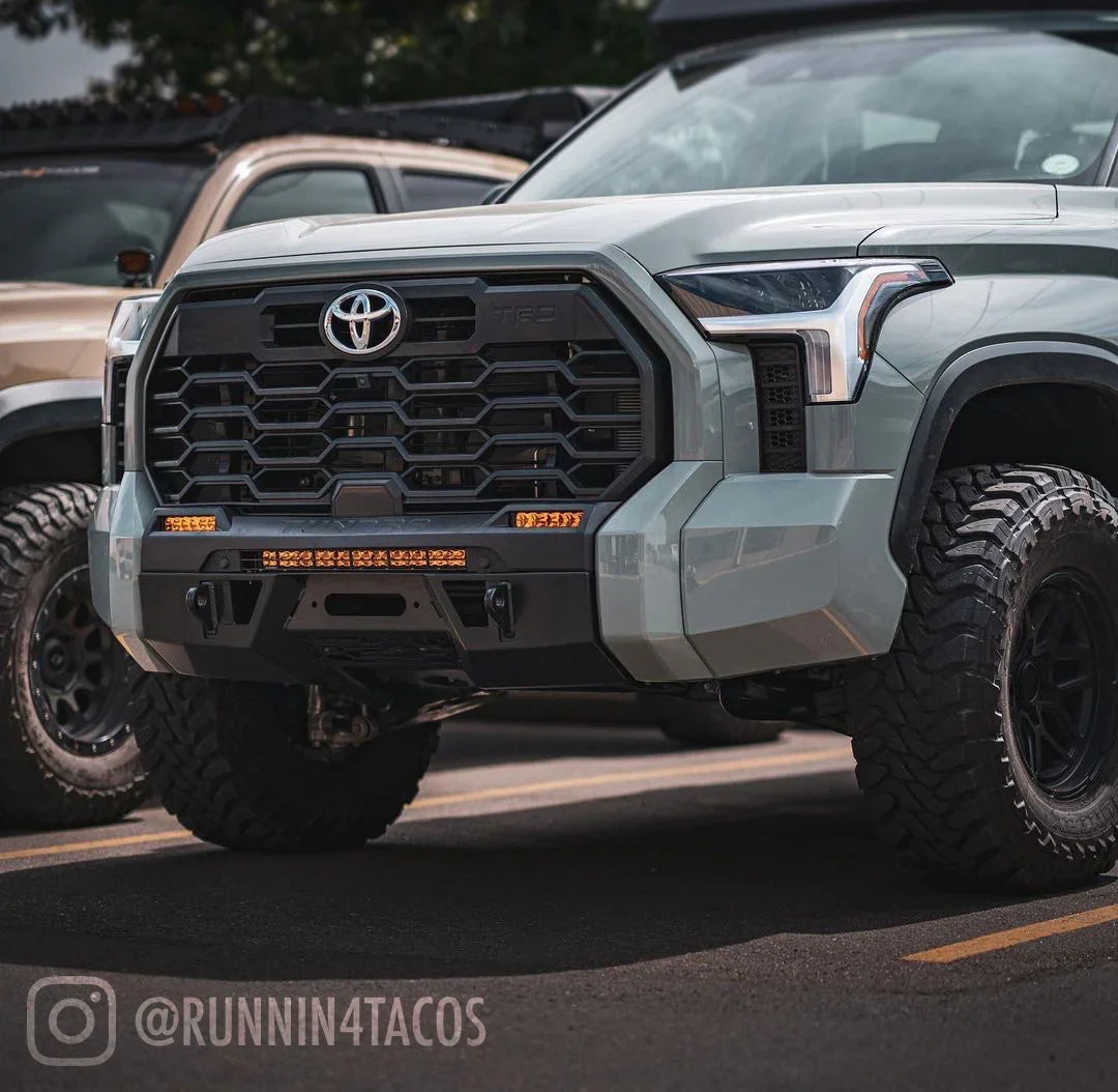 2022 Toyota Tundra with covert off-road bumper and LED lights in parking lot