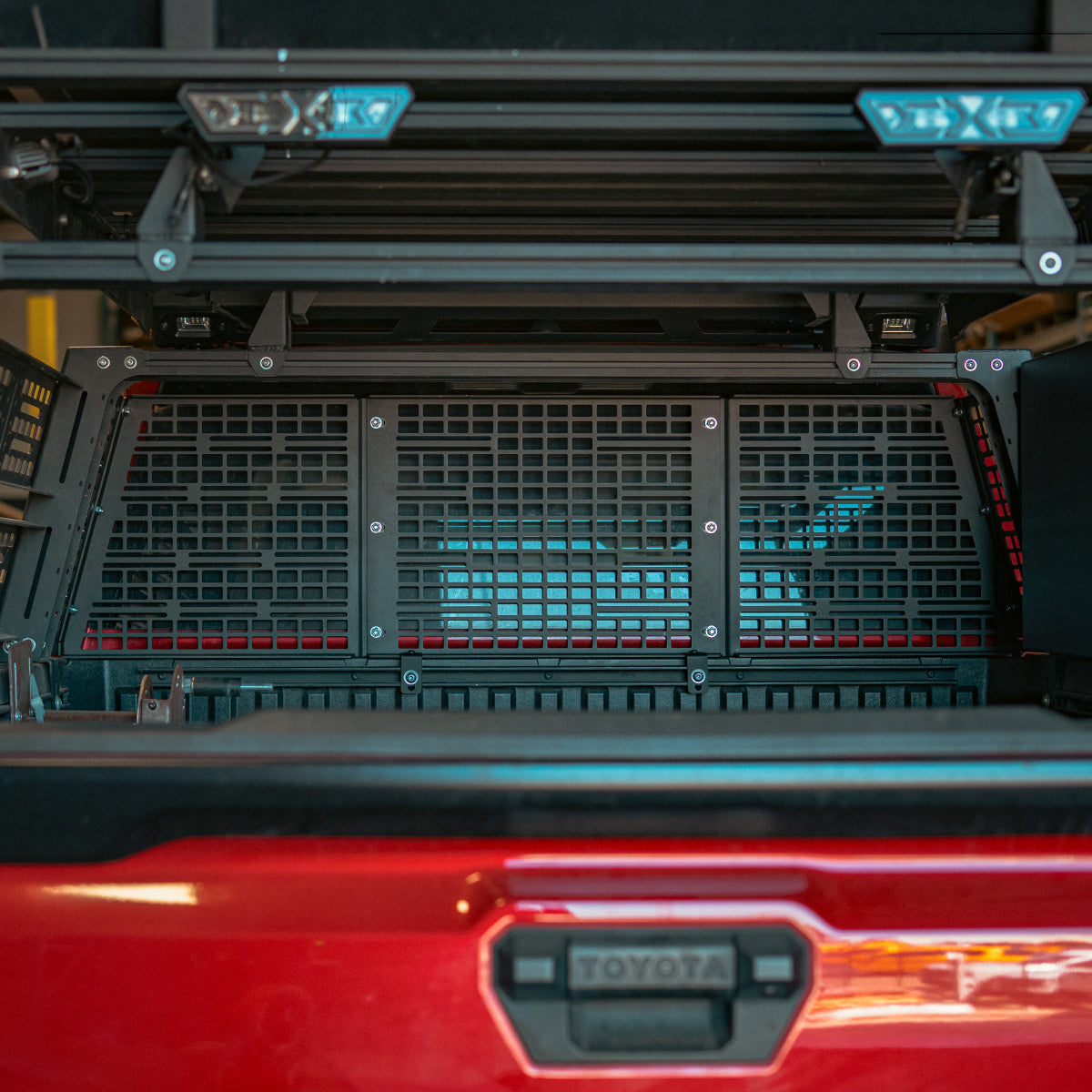Cali Raised LED MOLLE headache rack for Toyota Tacoma overland bed rack