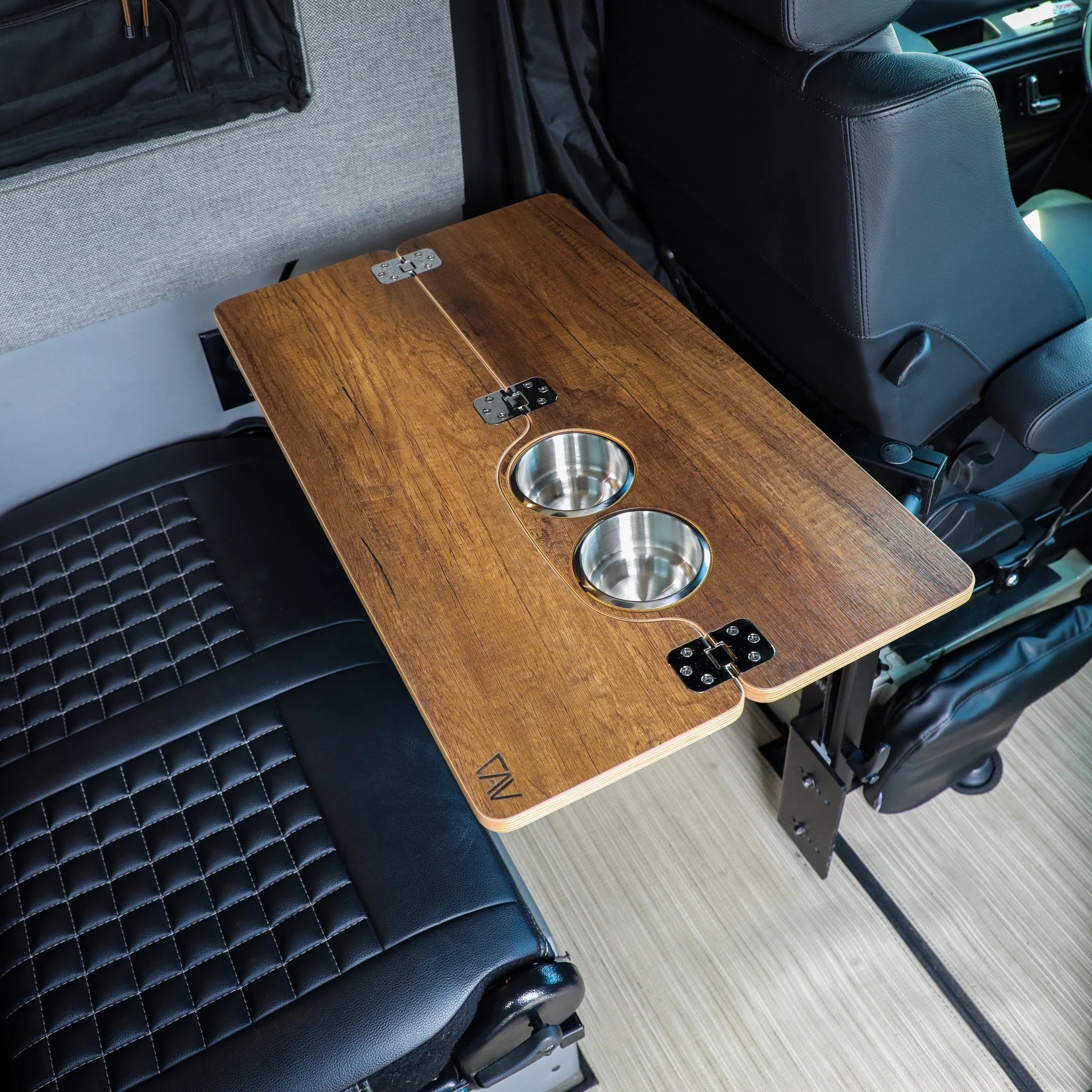 Foldable wood vehicle table with two built-in cup holders for overlanding interiors