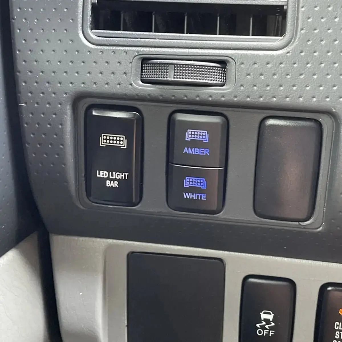 Cali Raised LED dual function amber and white OEM style switch for Toyota trucks