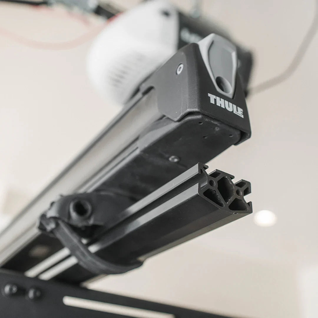 Close-up of Thule crossbar roof rack system for Toyota Tacoma overlanding
