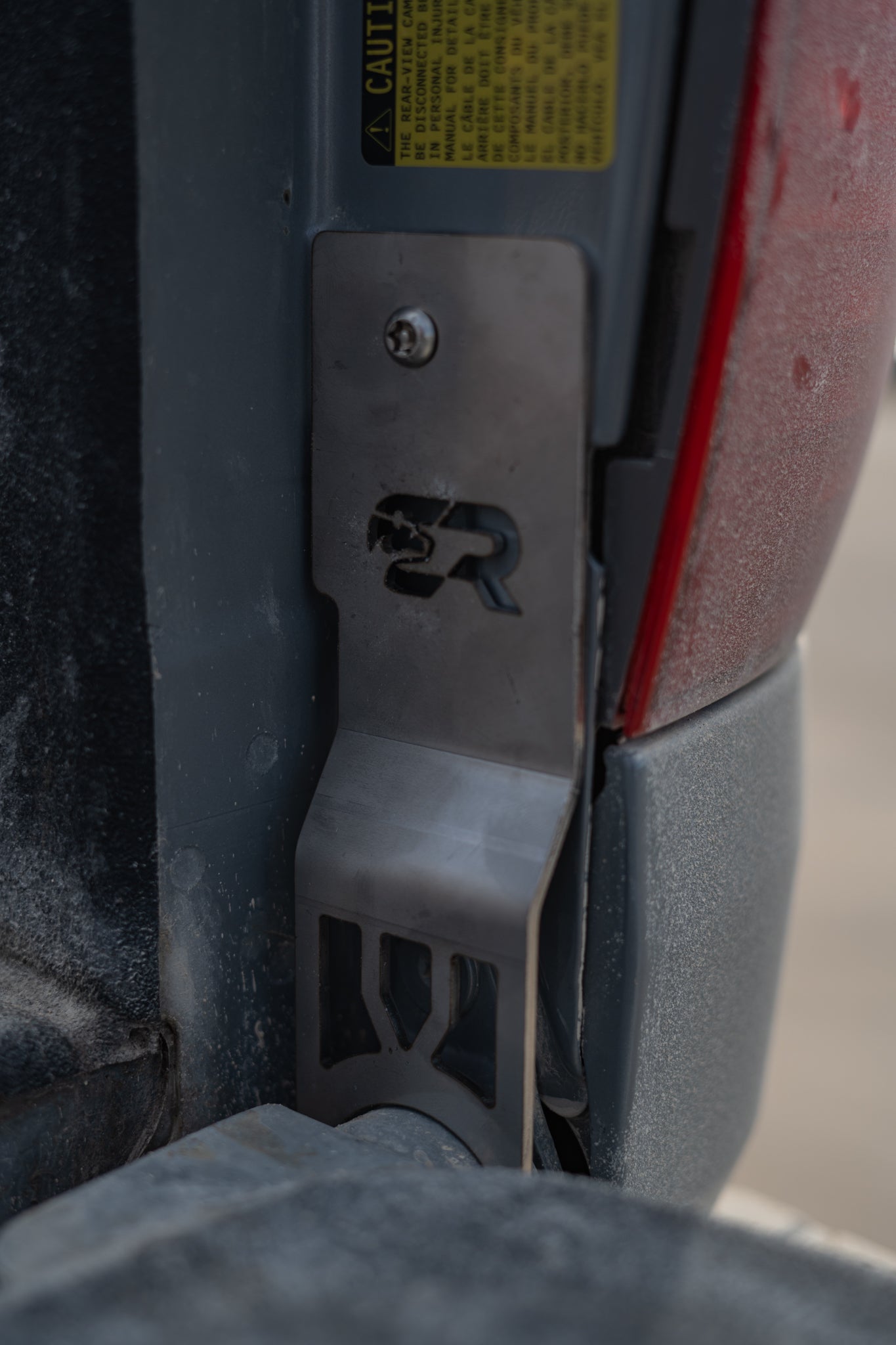 Tailgate theft protector installed on 2014-2021 Toyota Tundra truck tailgate latch